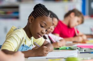 Kids writing at CEF NorCal East Bay’s Ministry Program
